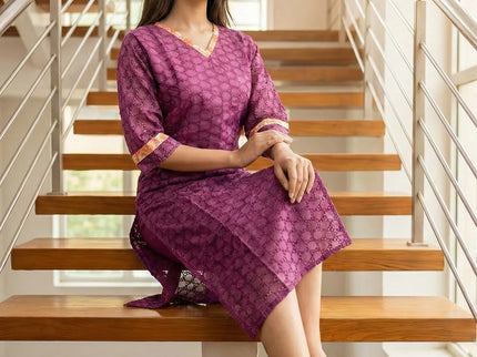 Textured fabric with all-over perforated geometric design Top