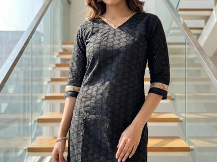 Textured fabric with all-over perforated geometric design Top